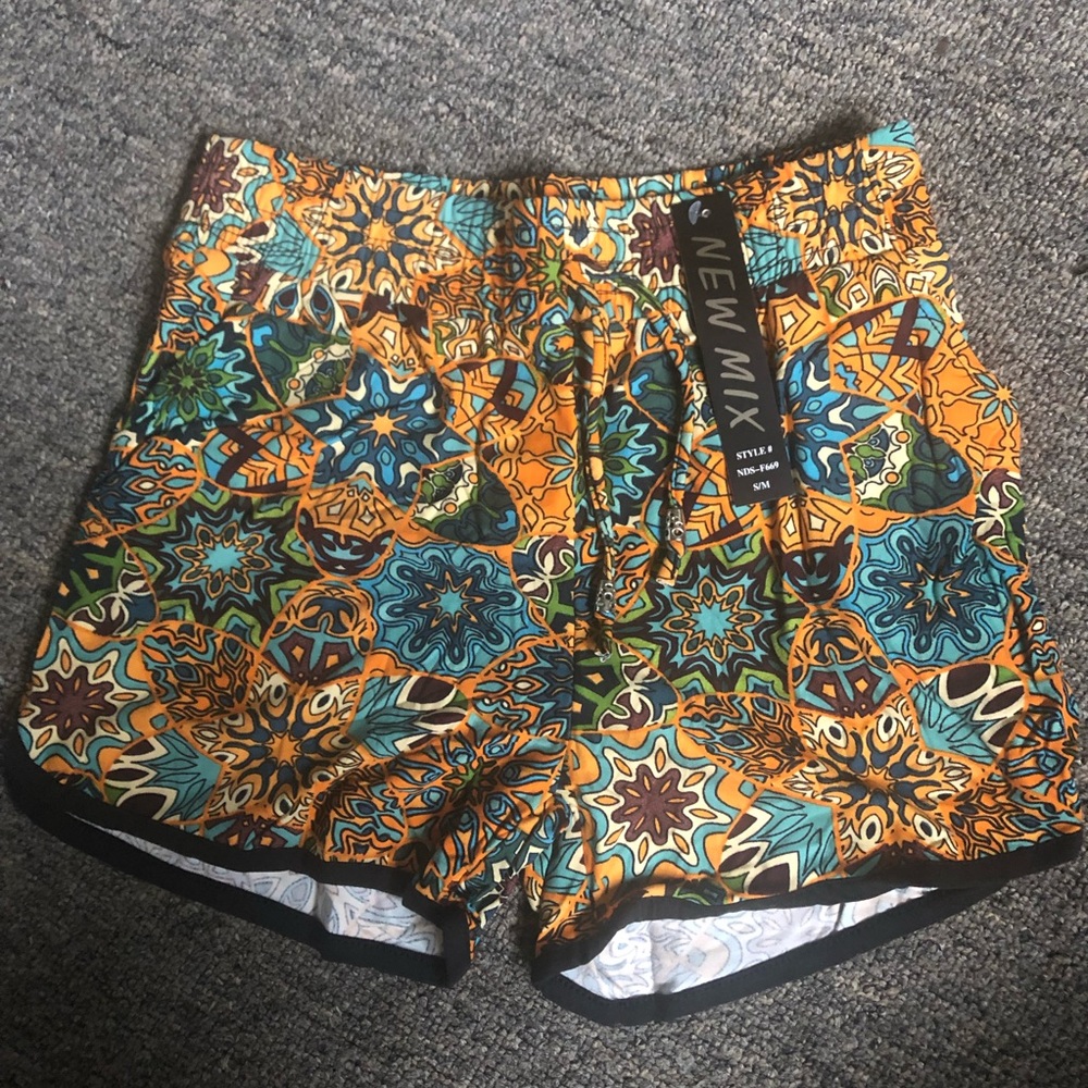 Orange and green dolphin shorts